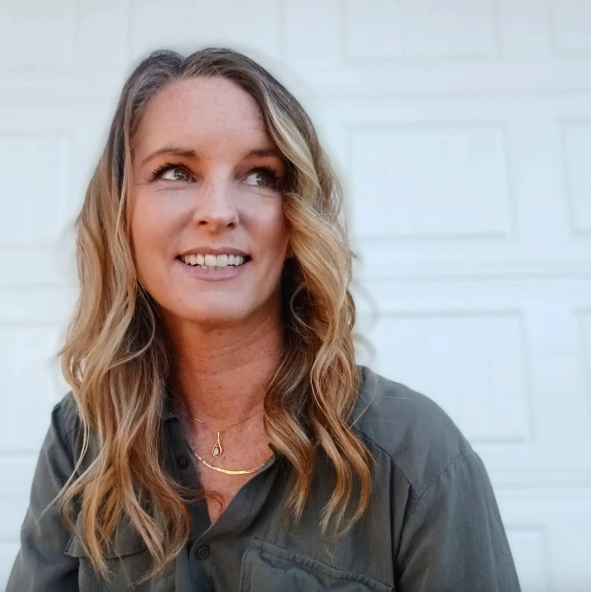 Heather MacLaren smiling and looking off to the side